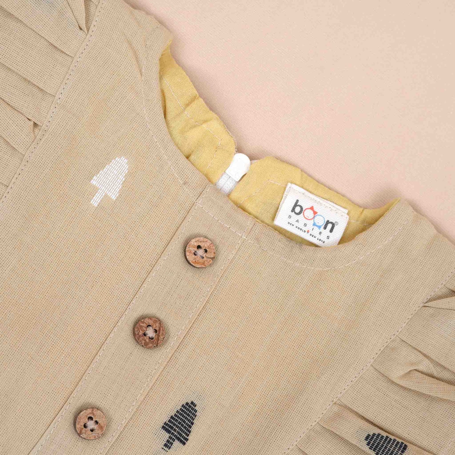 Beige Girls Printed Frock with Ruffle Sleeves and Pleated Skirt