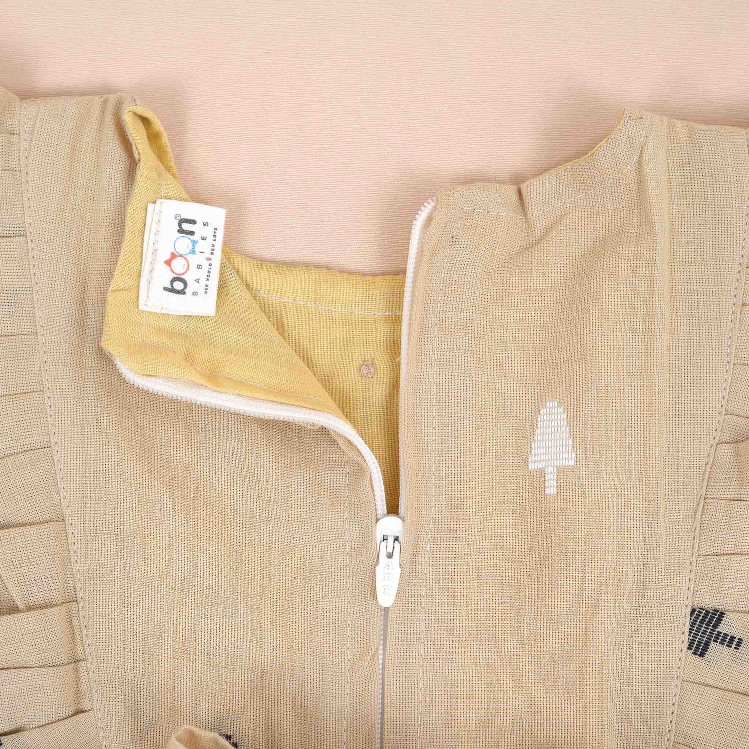 Beige Girls Printed Frock with Ruffle Sleeves and Pleated Skirt