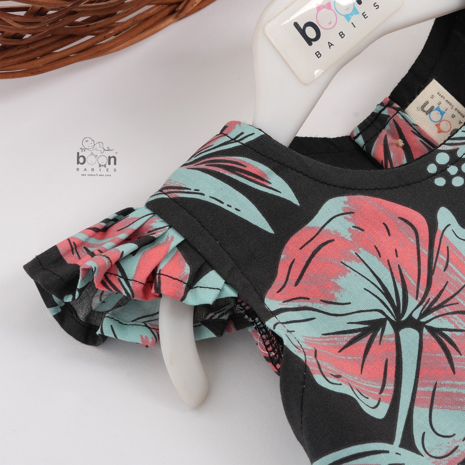 Stylish black cotton frock with floral prints and cap sleeves – comfy wear for girls aged 6M to 5Y.