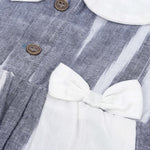 Black & White cotton ikat puff frock with contrast collar & bow. Sizes 6M–4Y. Elegant, comfy & festive-ready.