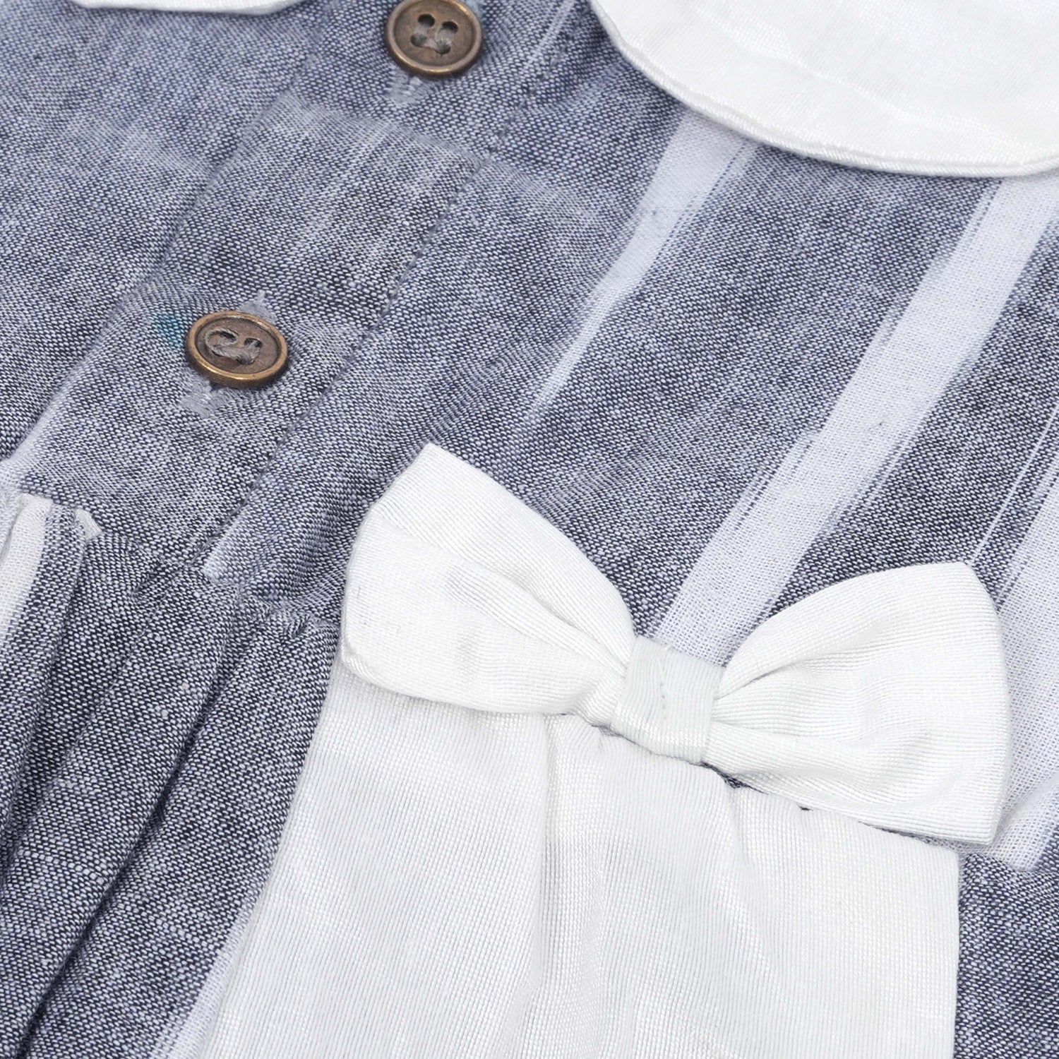 Black & White cotton ikat puff frock with contrast collar & bow. Sizes 6M–4Y. Elegant, comfy & festive-ready.