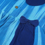 Blue cotton puff frock with navy collar & bow. Sizes 6M–4Y. Stylish, comfy & perfect for festive or casual wear.