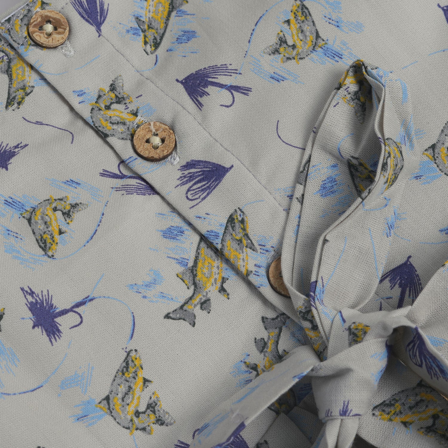 Blue floral cotton frock for girls with ruffle cap sleeves, designed for 6 months to 5 years – from Boon Babies kidswear collection, Coimbatore.
