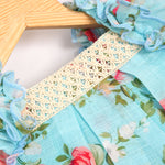 Charming linen baby frock in blue floral print with ruffled sleeves and lace yoke. Available for 6 months to 4 years.
