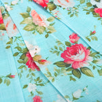 Charming linen baby frock in blue floral print with ruffled sleeves and lace yoke. Available for 6 months to 4 years.
