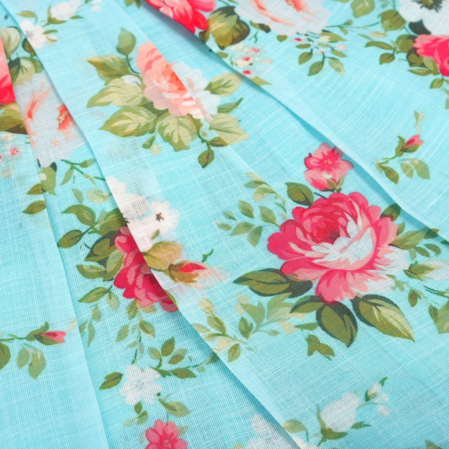 Charming linen baby frock in blue floral print with ruffled sleeves and lace yoke. Available for 6 months to 4 years.
