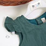 Minimalist bottle green frock in soft cotton. Cap sleeves. Sizes 6M to 5Y. Perfect for play or outings.
