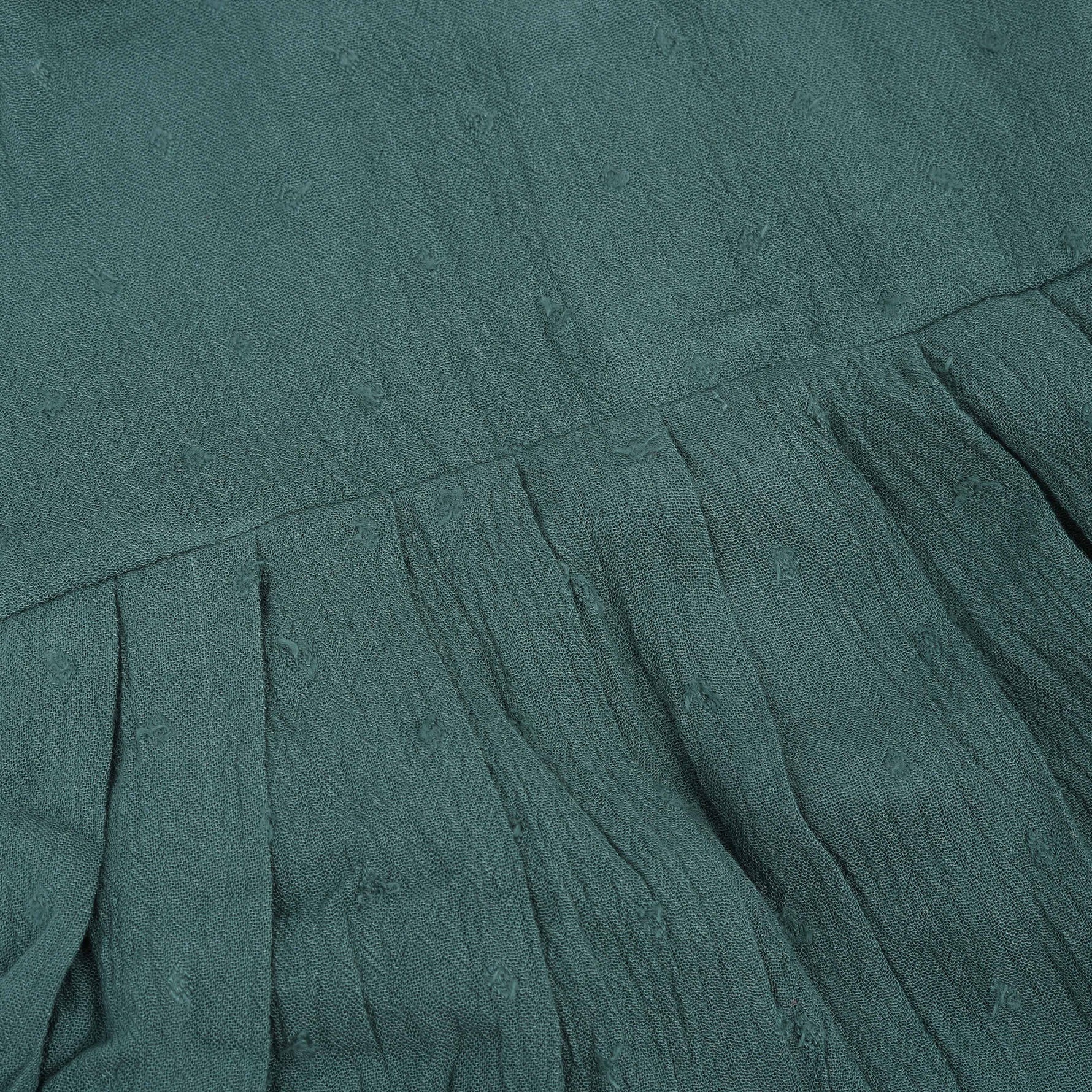 Minimalist bottle green frock in soft cotton. Cap sleeves. Sizes 6M to 5Y. Perfect for play or outings.
