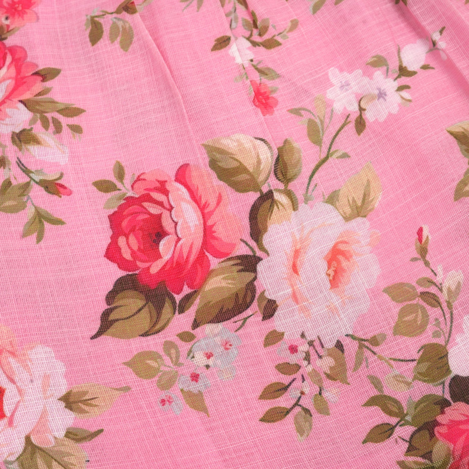 Chic dark pink linen frock with floral prints and ruffle sleeves. Sizes 6M–4Y. Ideal for festive and daily moments.
