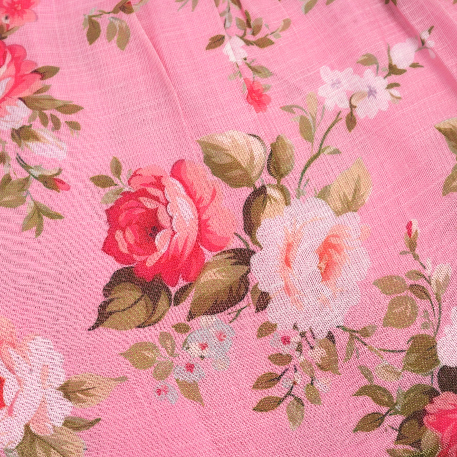 Chic dark pink linen frock with floral prints and ruffle sleeves. Sizes 6M–4Y. Ideal for festive and daily moments.
