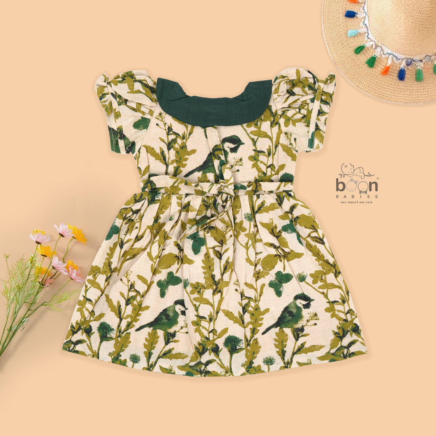 Nature-inspired bird print cotton Side Pleated Frock with green collar & bow. Ages 6M–4Y. Soft, breathable & stylish everyday festive wear.