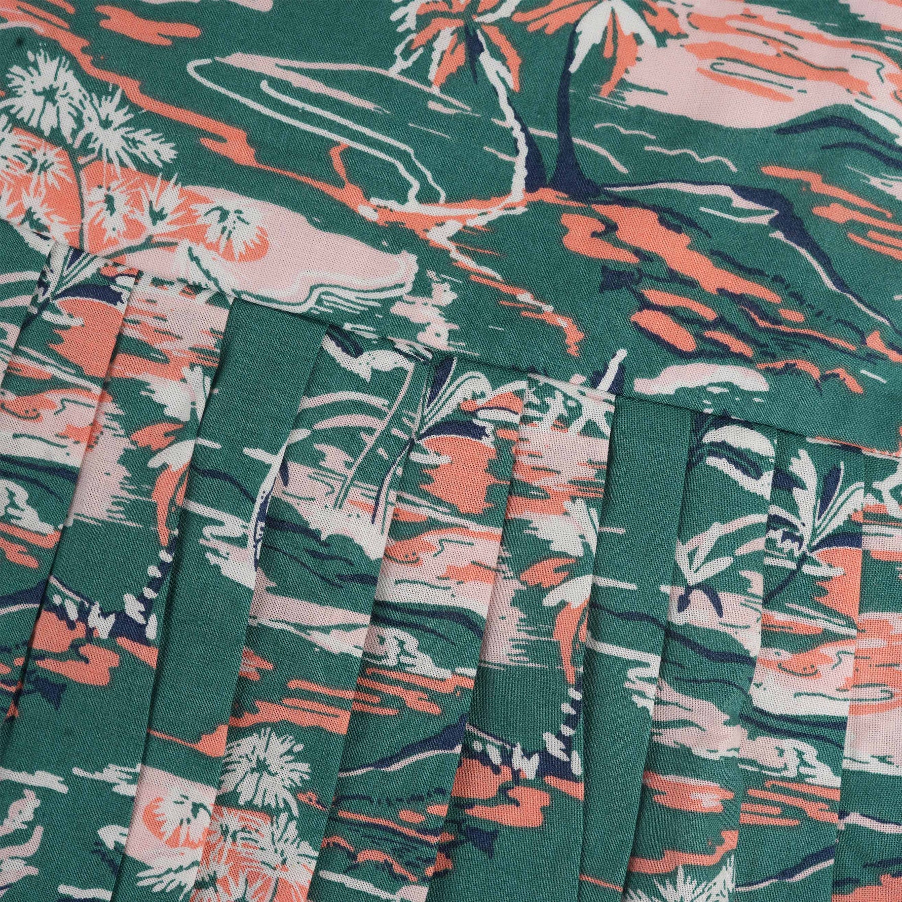 Green cotton frock with tropical island print and cap sleeves for baby girls aged 6 months to 5 years – Boon Babies kidswear collection from Coimbatore.
