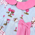 Grey cotton puff frock with pink collar, waist bow & lotus cow print. Cute & comfy for baby girls aged 6M–4Y.