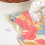 Girls multicolor leaf print cotton frock by Boon Babies with capsleeves, perfect for a breezy, beautiful look.
