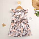Elegant cotton frock with peach & grey leaf print and cap sleeves. Ideal for girls aged 6M to 5Y.