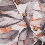 Elegant cotton frock with peach & grey leaf print and cap sleeves. Ideal for girls aged 6M to 5Y.