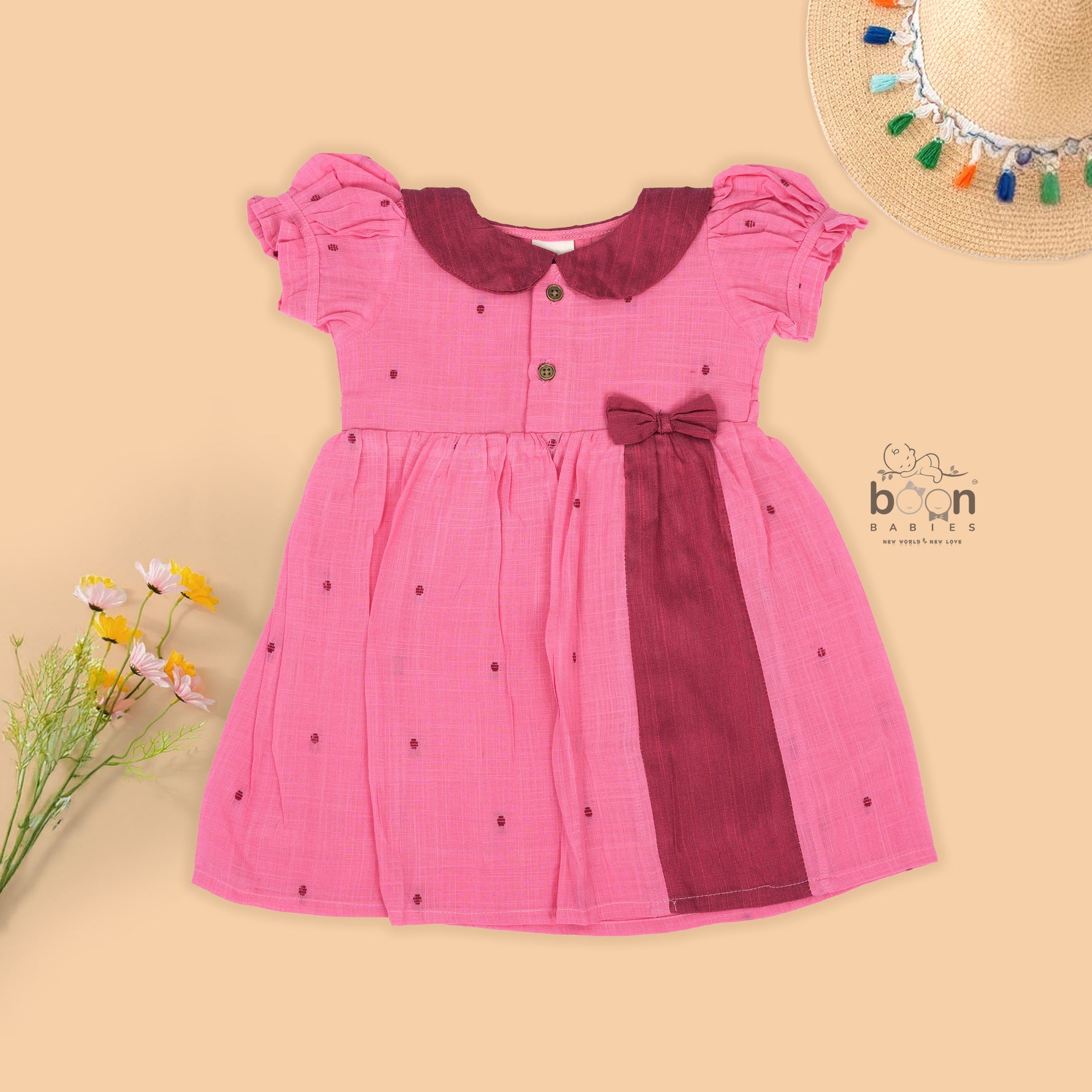 Pink Side Pleated Frock maroon collar & bow detailing. Sizes 6M–4Y. Perfect blend of comfort & festive charm for baby girls.