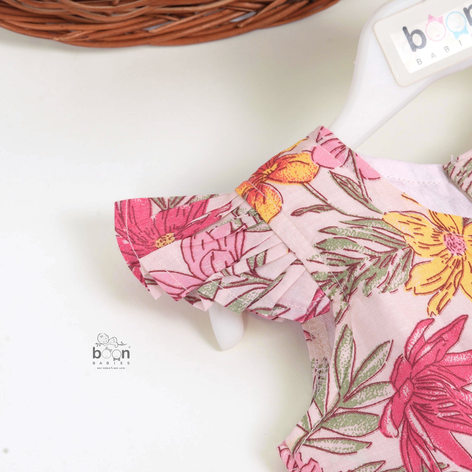 Bright floral cotton frock with cap sleeves for girls aged 6M to 5Y. Light, breathable & picture-perfect!
