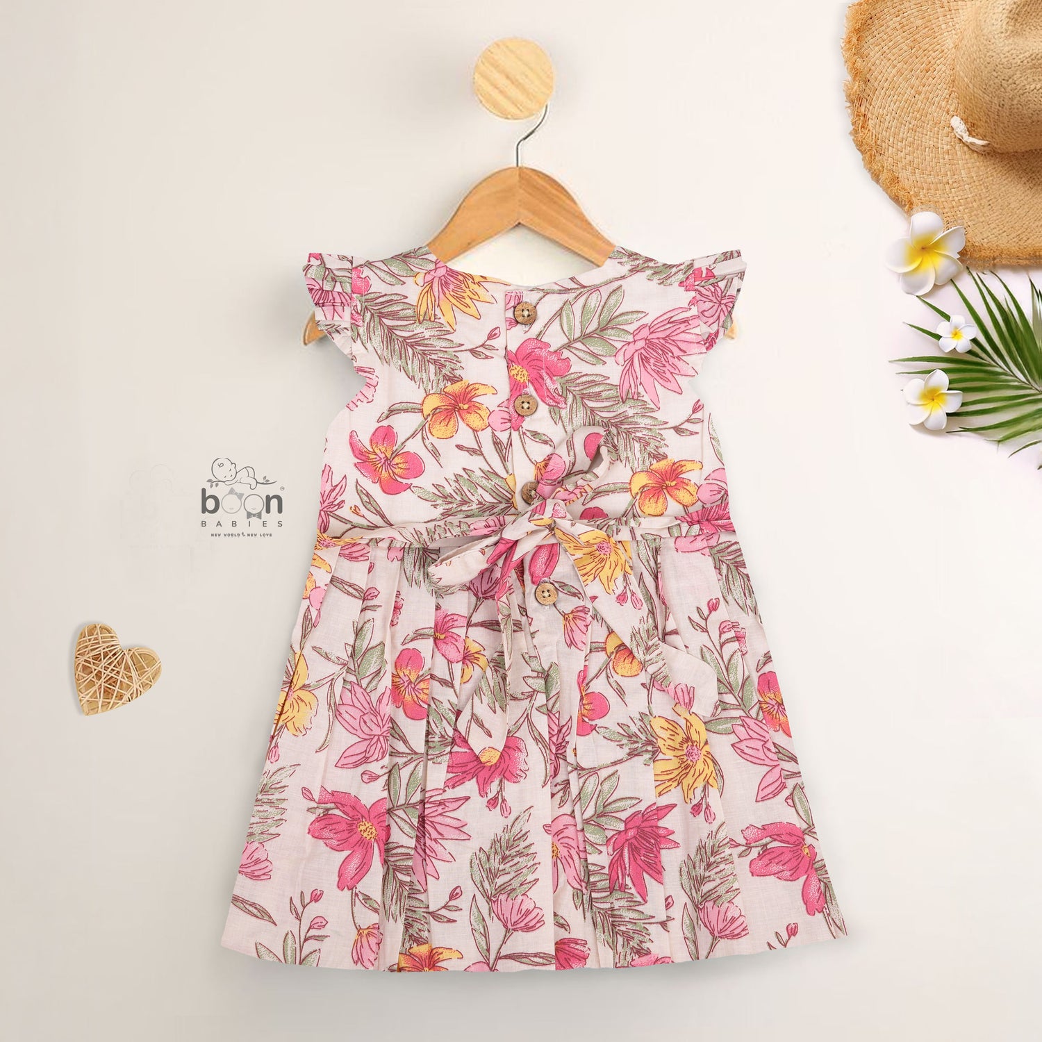 Bright floral cotton frock with cap sleeves for girls aged 6M to 5Y. Light, breathable & picture-perfect!
