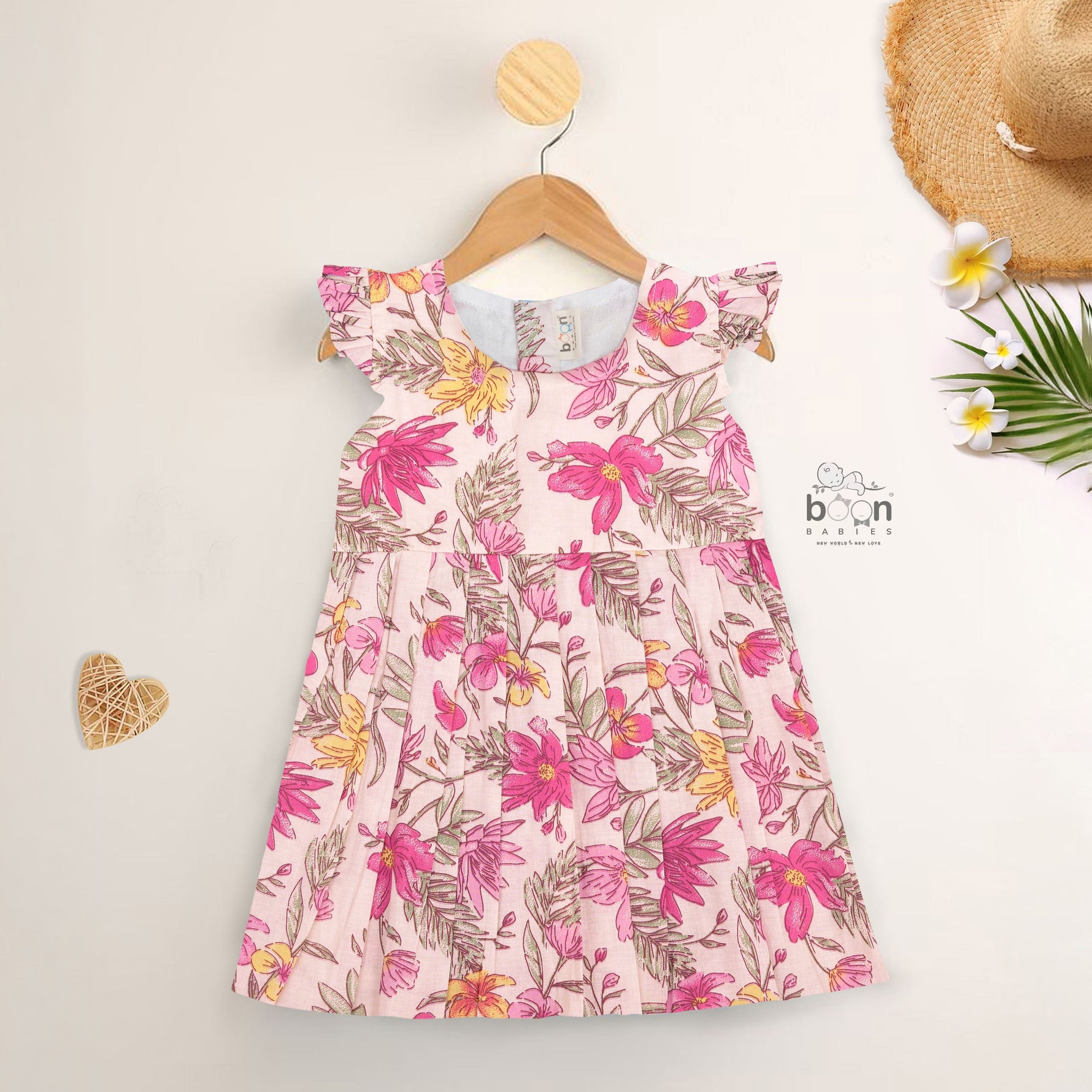 Bright floral cotton frock with cap sleeves for girls aged 6M to 5Y. Light, breathable & picture-perfect!
