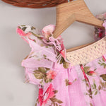 Adorable pink floral frock with ruffle sleeves in breathable linen. Sizes 6M–4Y. Perfect for stylish little girls.
