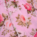 Adorable pink floral frock with ruffle sleeves in breathable linen. Sizes 6M–4Y. Perfect for stylish little girls.
