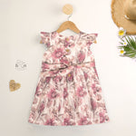 Pink floral cotton frock for girls with ruffle cap sleeves, designed for 6 months to 5 years – from Boon Babies clothing collection in Coimbatore.
