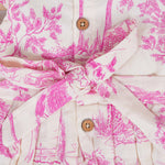 Pink wildlife print cotton frock with flutter sleeves for girls aged 6 months to 5 years. Breathable, soft and playful design from Boon Babies.
