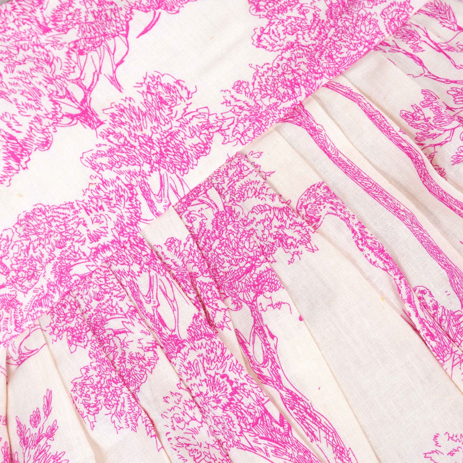 Pink wildlife print cotton frock with flutter sleeves for girls aged 6 months to 5 years. Breathable, soft and playful design from Boon Babies.
