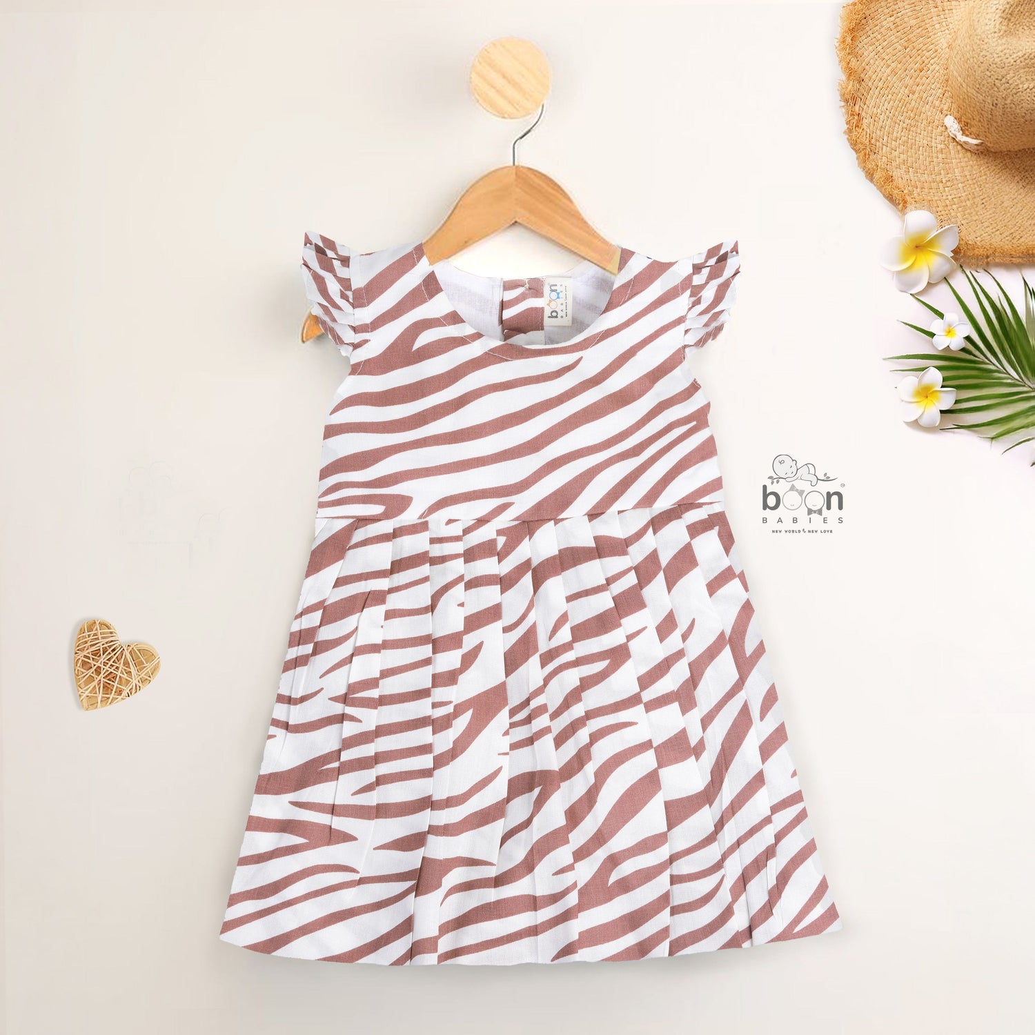 Pink zebra print cotton frock with cap sleeves for girls aged 6 months to 5 years – Boon Babies babywear from Coimbatore.
