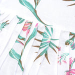 Toddler girl in a white sleeveless frock with navy blue and pink forest animal print – pure cotton summer dress from Boon Babies, Coimbatore.