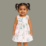 Toddler girl in a white sleeveless frock with navy blue and pink forest animal print – pure cotton summer dress from Boon Babies, Coimbatore.