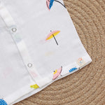 Soft, breathable printed muslin baby jabla with umbrella print from Boon Babies, designed for comfort and easy wear.