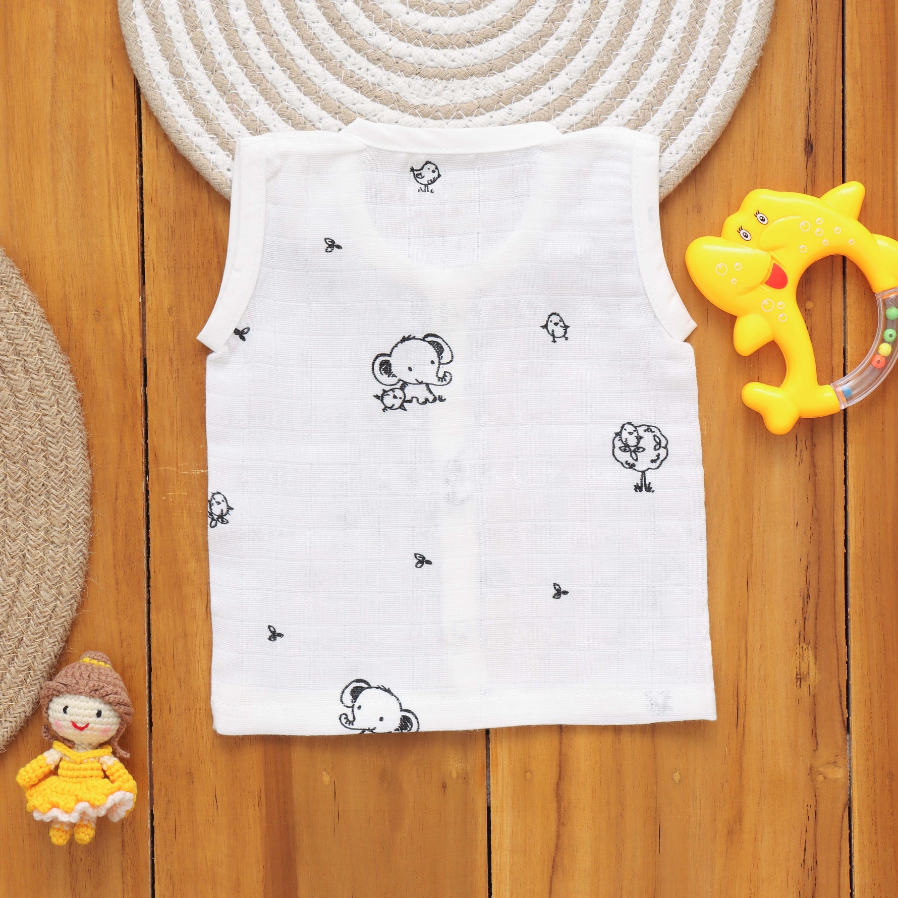 Organic muslin babywear with elephant print, soft and breathable printed Jabla by Boon Babies for 3-month-old infants.