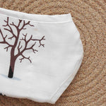 Soft muslin baby nappy with cute forest animal print. Size 0–3 months. Reusable, breathable, and tie-up style for a gentle fit.
