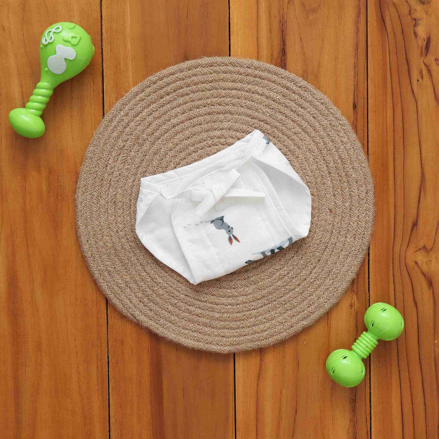 Soft muslin baby nappy with cute forest animal print. Size 0–3 months. Reusable, breathable, and tie-up style for a gentle fit.
