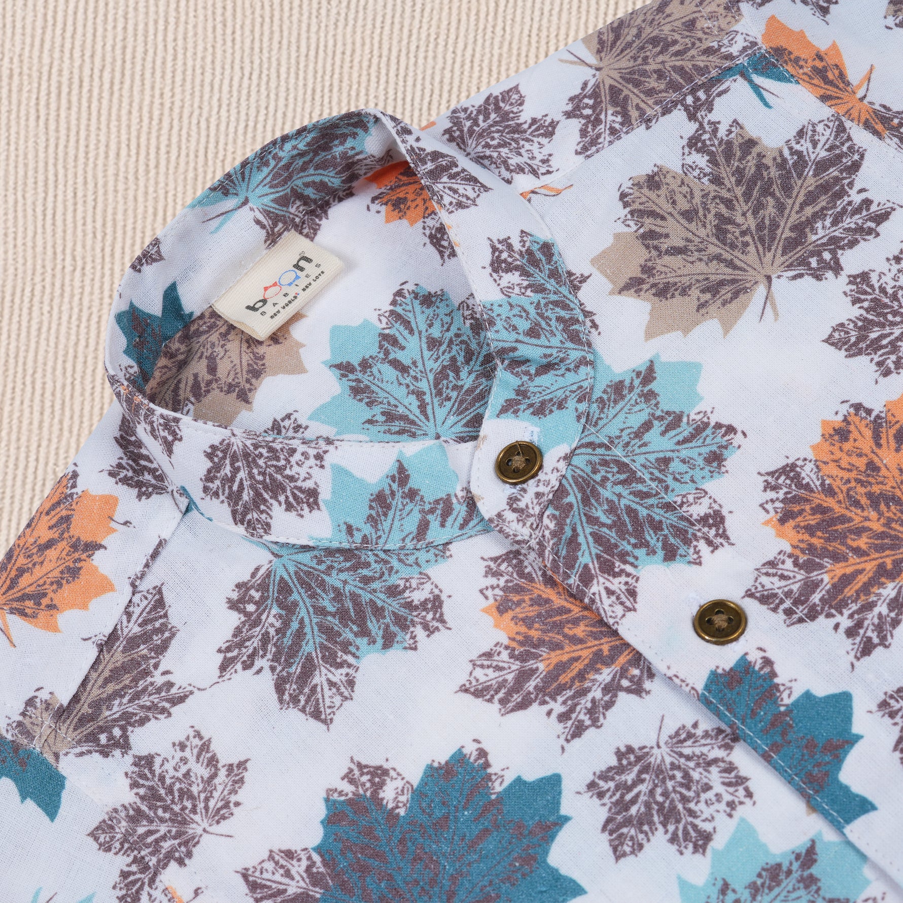 Boys cotton printed shirt with Chinese Mandarin collar and leaf pattern, by Boon Babies, suitable for 6-12 months.