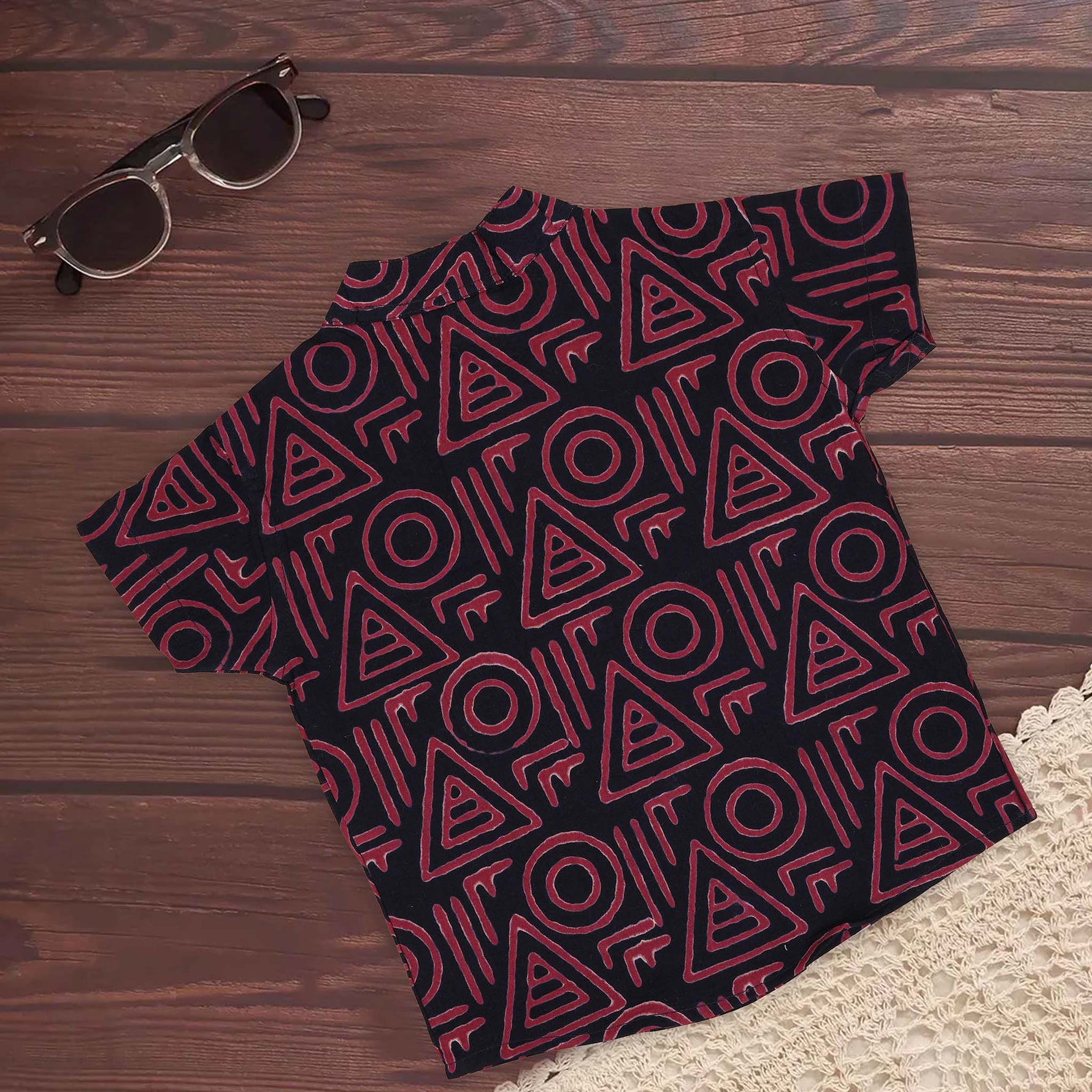 Red tribal printed cotton shirt with Chinese collar for babies by Boon Babies, featuring vibrant tribal patterns and comfortable fabric.