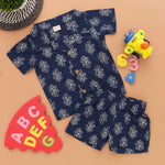 Navy blue floral print boys' shirt and shorts set with open collar by Boon Babies, made from Jaipur cotton for ages 6-12 months.