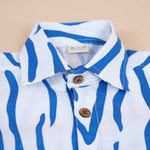 Boys cotton printed shirt by Boon Babies with blue and white wavy stripes and straight collar, suitable for ages 6-12 months.