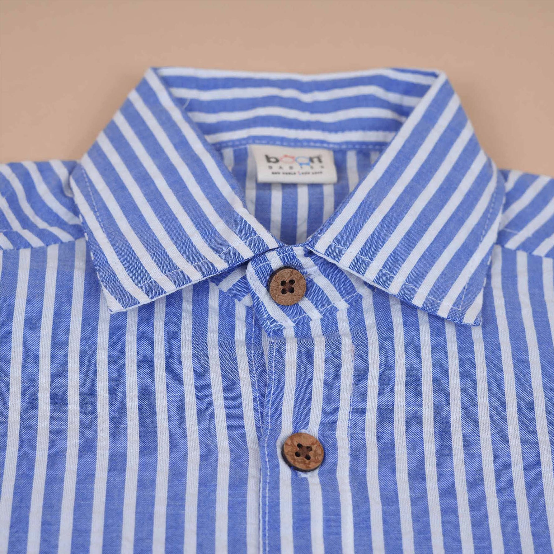 Boys cotton shirt by Boon Babies with blue brushstroke pattern, straight collar, made from soft cotton for ages 6 to 12 months.