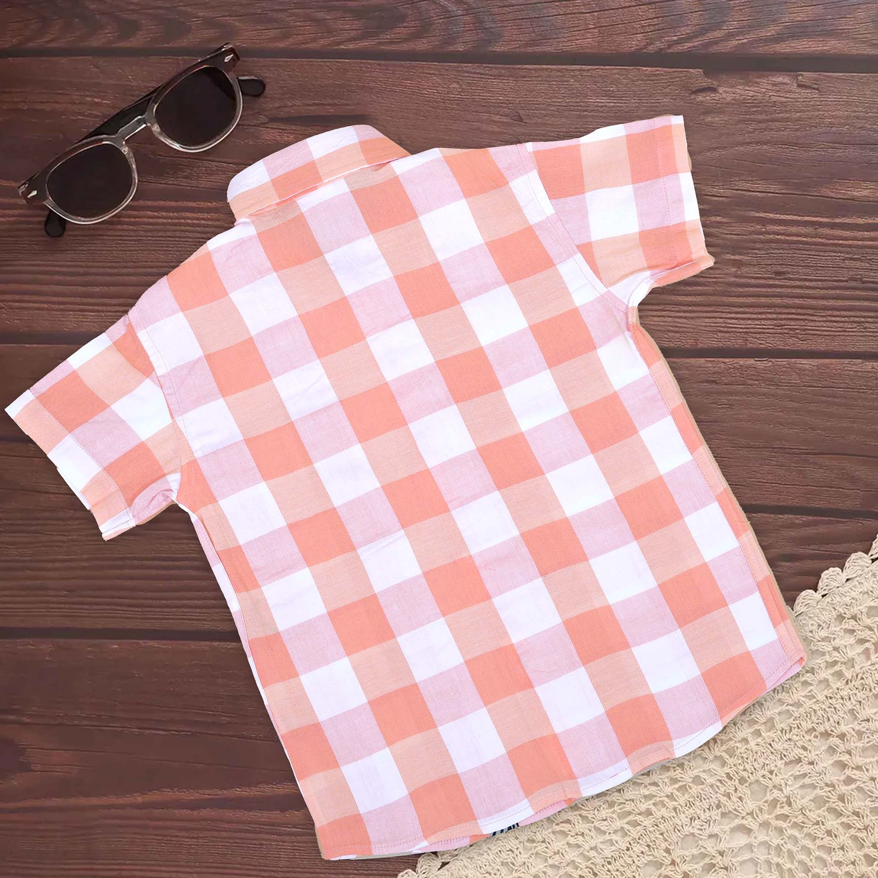 Peach gingham cotton printed shirt with straight collar for babies, by Boon Babies, featuring a classic design and soft fabric.