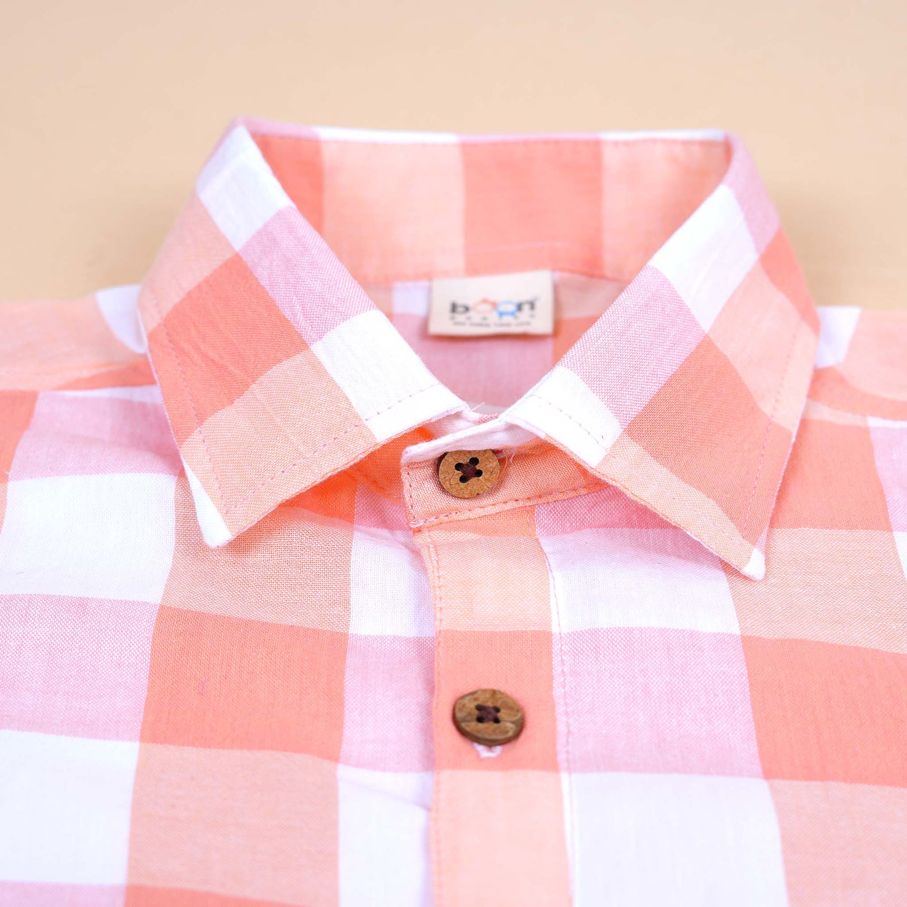 Peach Gingham Cotton Shirt for babies by Boon Babies, featuring a printed design and straight collar, suitable for 6-12 months.