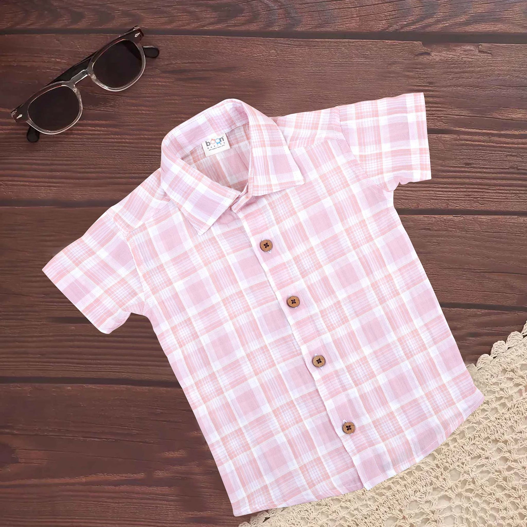 Pink plaid cotton shirt with straight collar for babies, featuring printed design and comfortable fit, by Boon Babies.