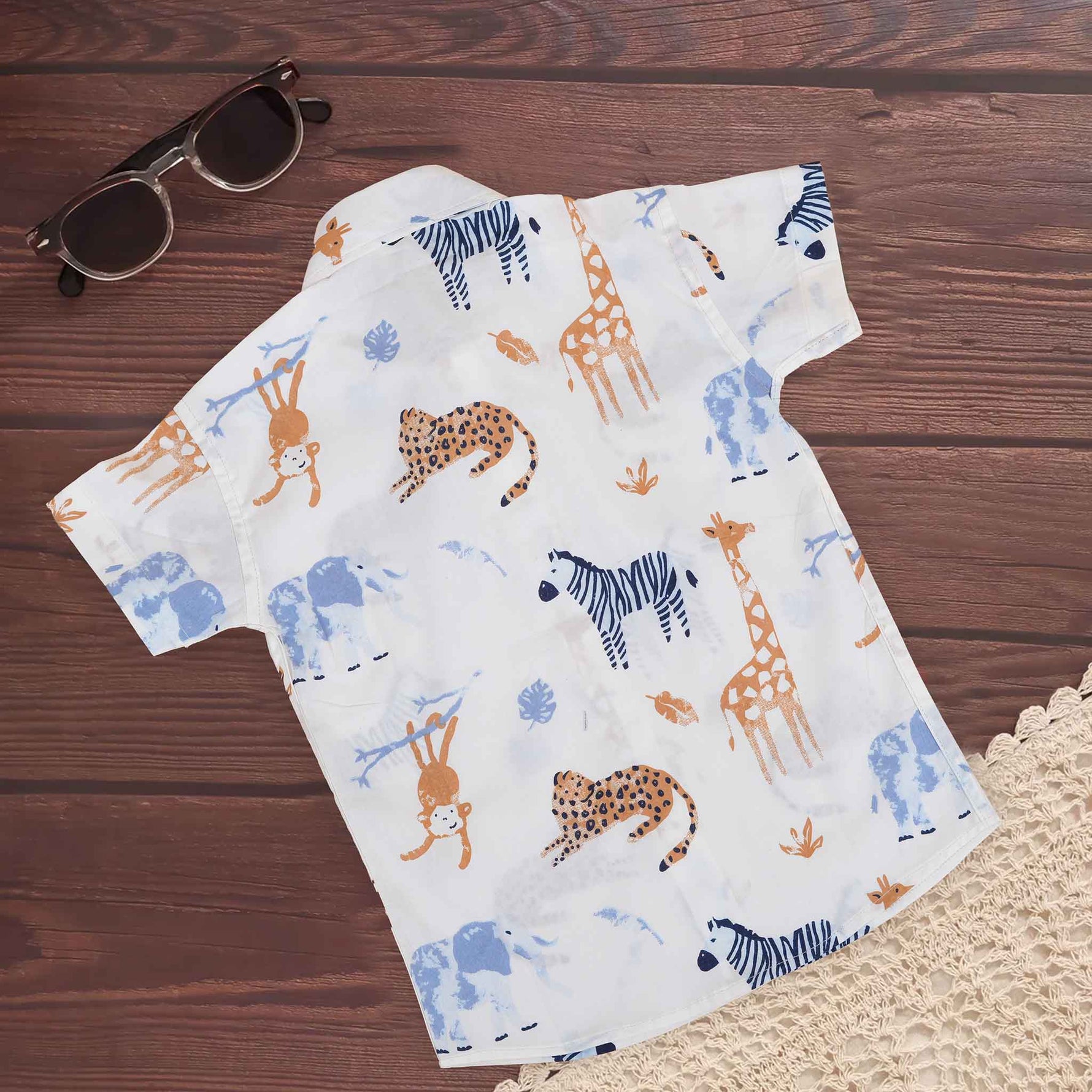 Boys cotton shirt with jungle animal safari print, straight collar, white cotton fabric, by Boon Babies for ages 6-12 months.