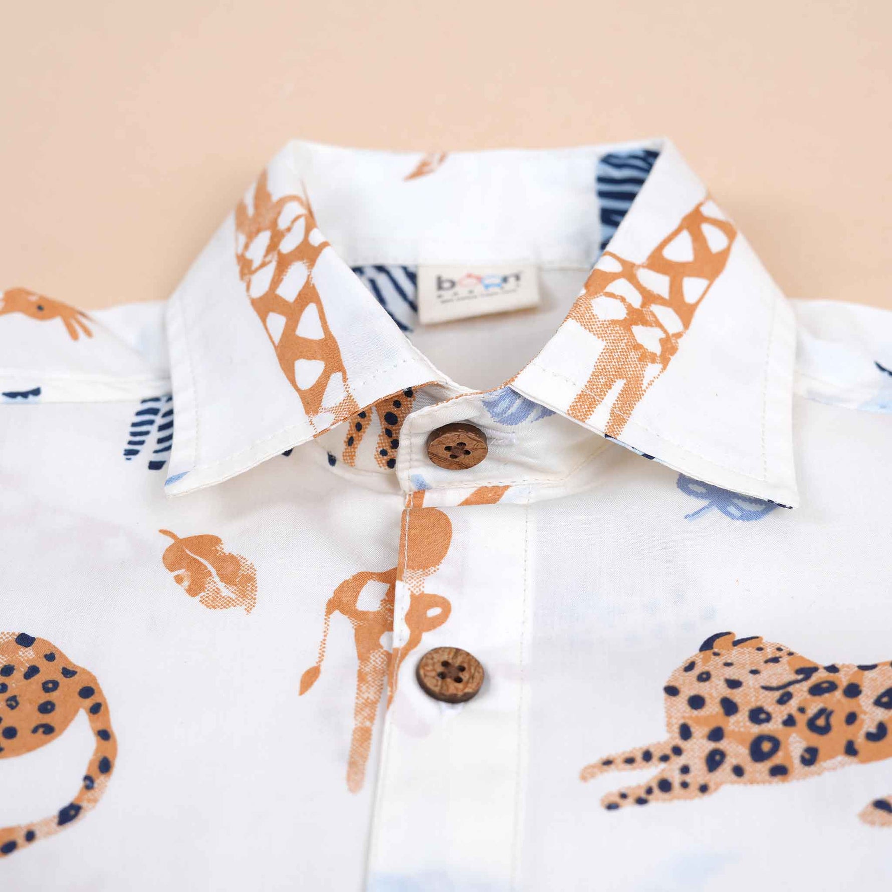 Boys cotton shirt with jungle animal safari print from Boon Babies, straight collar, white cotton fabric, suitable for 6-12 months.