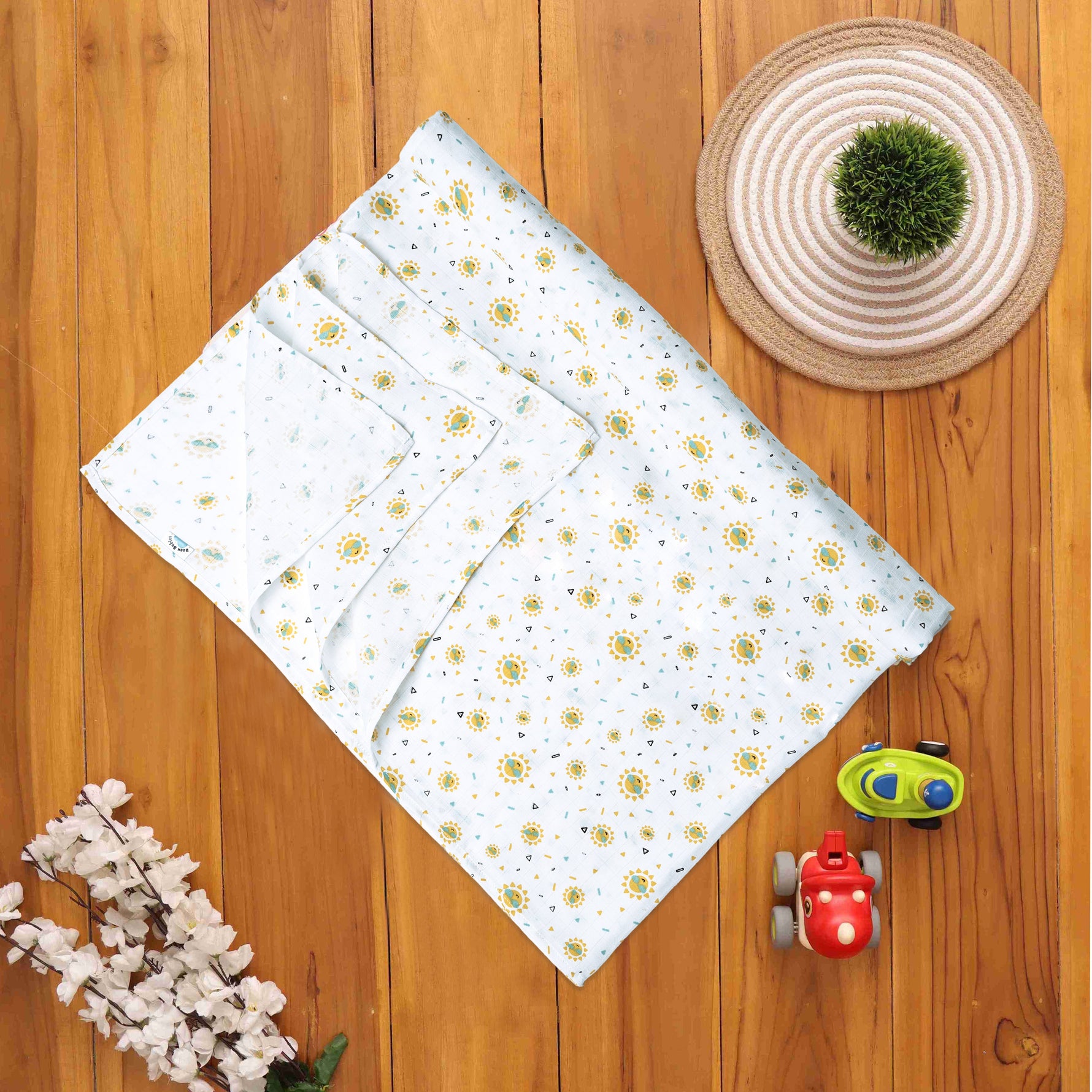 Adorable Muslin Baby Swaddles with Charming Prints Boon Babies