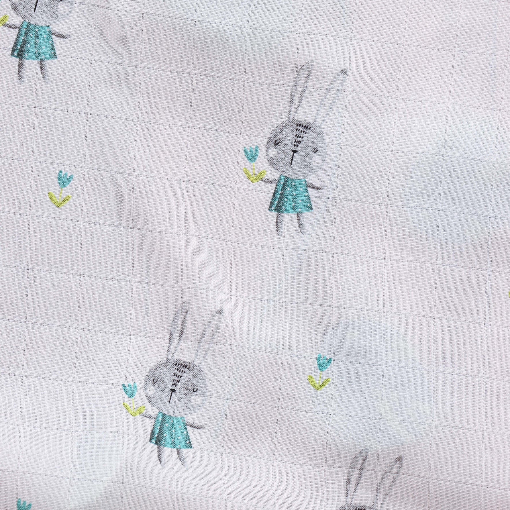 Muslin baby towel in cute bunny print. Lightweight, absorbent & ideal for daily baby care.