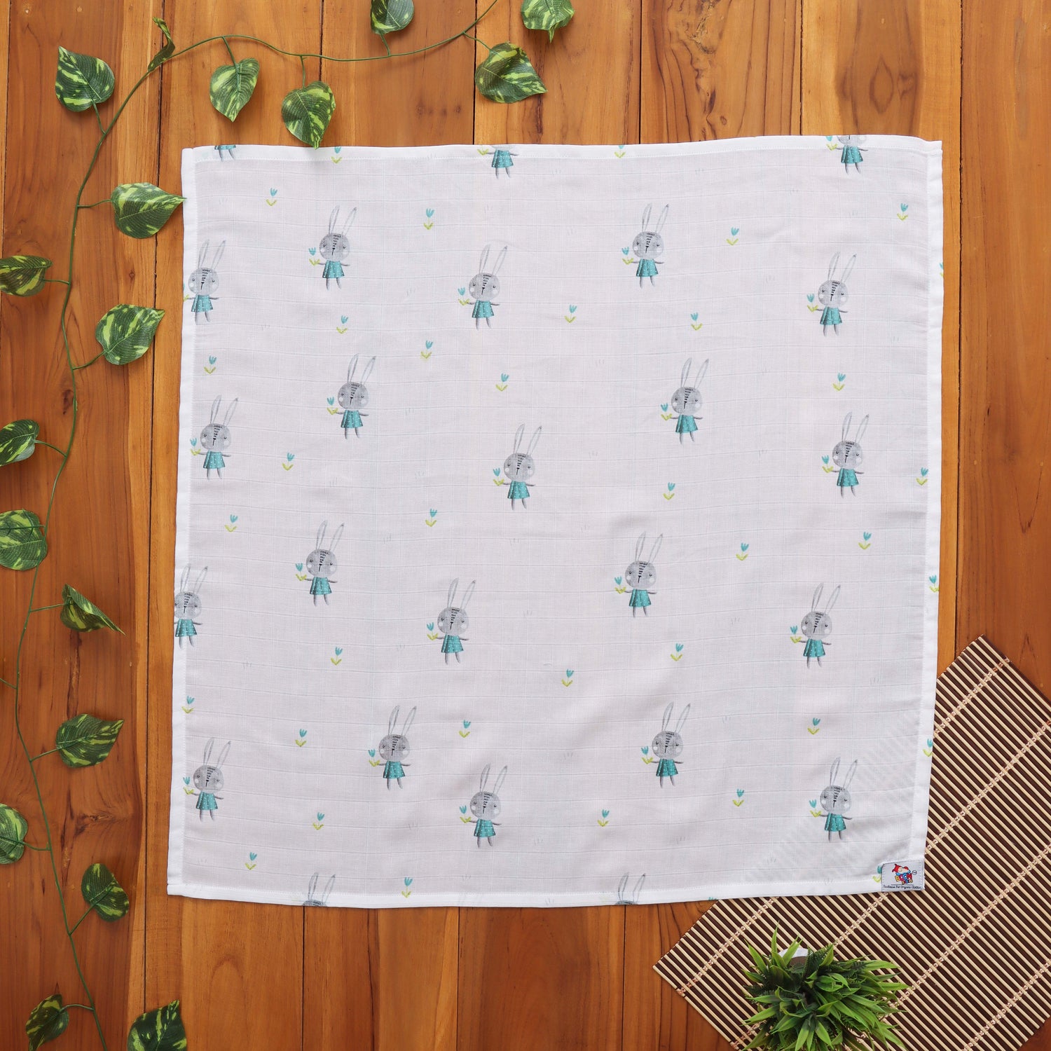 Muslin baby towel in cute bunny print. Lightweight, absorbent & ideal for daily baby care.