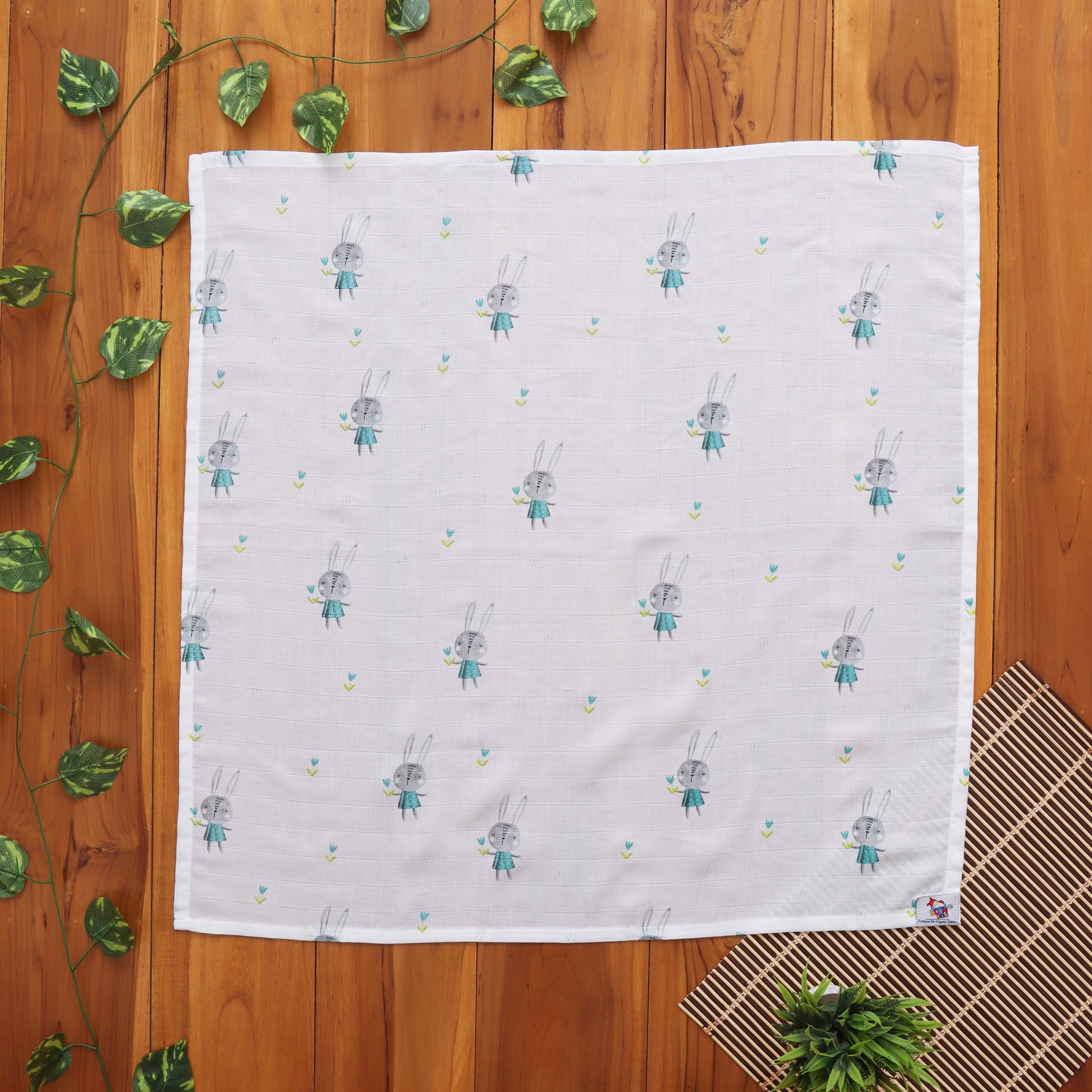 Muslin baby towel in cute bunny print. Lightweight, absorbent & ideal for daily baby care.